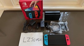 Mint
													Nintendo Switch - OLED - Red & Blue, 64 GB, photo 1 of 8