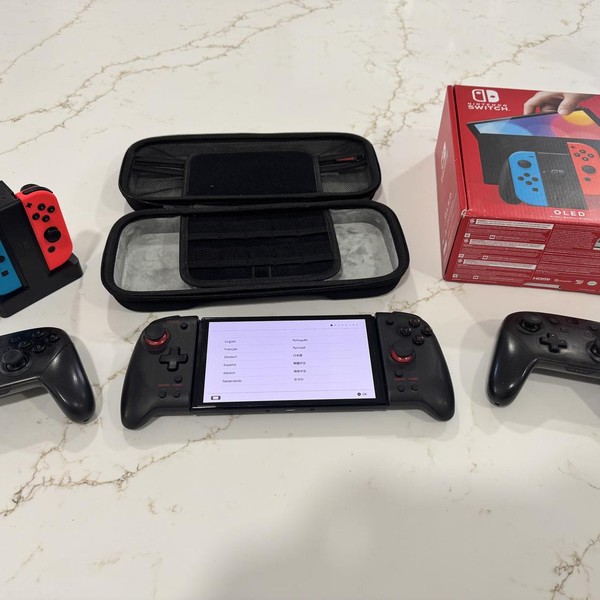 Nintendo Switch - OLED - 64 GB, Red & Blue