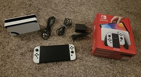 Mint
													Nintendo Switch - OLED - White, 64 GB, photo 2 of 9