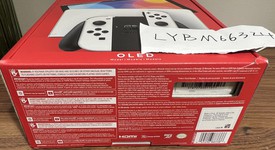 New
													Nintendo Switch - OLED - White, 64 GB, photo 5 of 6