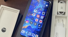 Mint
													Xiaomi 14 Ultra - Unlocked Non-US, White, 512 GB, 16 GB, photo 4 of 11