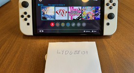 Mint
													Nintendo Switch - OLED - White, 64 GB, photo 1 of 6