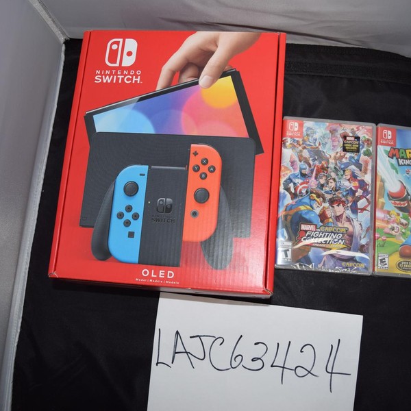 Nintendo Switch - OLED - 64 GB, Red & Blue