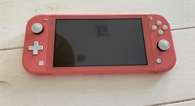 Good
													Nintendo Switch Lite - Coral, photo 2 of 7