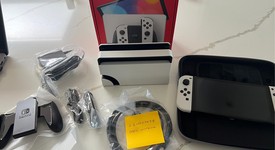 Mint
													Nintendo Switch - OLED - White, 64 GB, photo 4 of 6