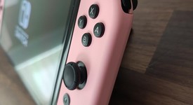 Mint
													Nintendo Switch - OLED - White, 64 GB, photo 4 of 13