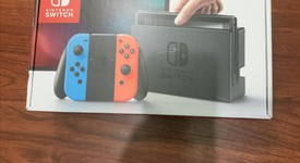 New
													Nintendo Switch - Red & Blue, 32 GB, photo 1 of 4