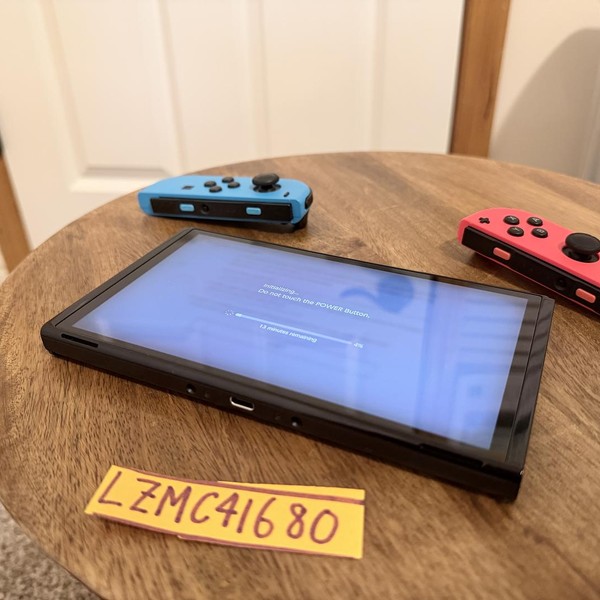 Nintendo Switch - OLED - 64 GB, Red & Blue