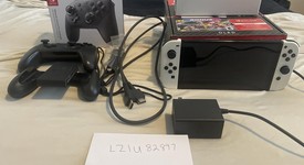 Mint
													Nintendo Switch - OLED - White, 64 GB, photo 3 of 4