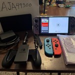 Mint Nintendo Switch - OLED - 64 GB, Red & Blue