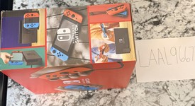 New
													Nintendo Switch - Red & Blue, 32 GB, photo 1 of 5