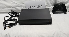 Good
													Xbox One X (2017) - Black, Scorpio, photo 2 of 7