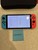 Mint Nintendo Switch - OLED - Red & Blue, 64 GB