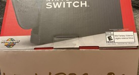 New
													Nintendo Switch 2 - Red & Blue, Standard, photo 2 of 4