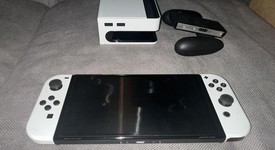 Mint
													Nintendo Switch - OLED - White, 64 GB, photo 4 of 11