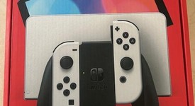 New
													Nintendo Switch - OLED - White, 64 GB, photo 2 of 6