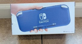 New
													Nintendo Switch Lite - Blue, photo 4 of 4