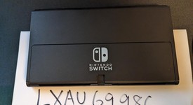 Good
													Nintendo Switch - OLED - Red & Blue, 64 GB, photo 4 of 11