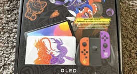 New
													Nintendo Switch - OLED - Violet, 64 GB, Pokemon Scarlet & Violet, photo 1 of 4