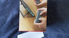 New
													Nintendo Switch 2 - Red & Blue, Standard, photo 3 of 5