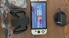 Mint
													Nintendo Switch - OLED - White, 64 GB, photo 5 of 9