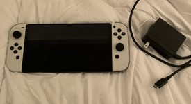 Mint
													Nintendo Switch - OLED - White, 64 GB, photo 2 of 10