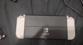 Mint
													Nintendo Switch - OLED - White, 64 GB, photo 3 of 8