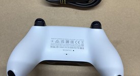 Mint
													PlayStation 5 Pro (2024) - Gray, 2 TB, 30th Anniversary, photo 3 of 9