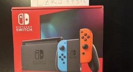 New
													Nintendo Switch - Red & Blue, 32 GB, photo 1 of 4