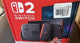 New
													Nintendo Switch 2 - Red & Blue, Standard, photo 2 of 3