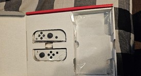 Mint
													Nintendo Switch - OLED - White, 64 GB, photo 5 of 11