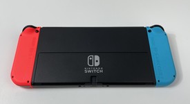 New
													Nintendo Switch - OLED - Red & Blue, 64 GB, photo 5 of 9