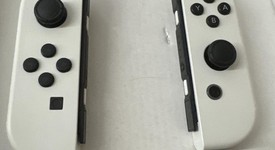 Mint
													Nintendo Switch - OLED - White, 64 GB, photo 5 of 11