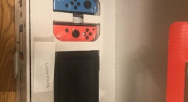 New
													Nintendo Switch - Red & Blue, 32 GB, photo 3 of 3