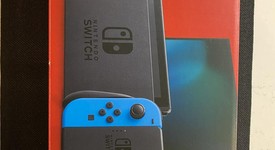 Mint
													Nintendo Switch - Neon Blue, 32 GB, photo 1 of 5