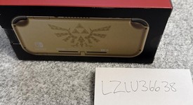 Mint
													Nintendo Switch Lite - Gold, Hyrule Edition, photo 2 of 9