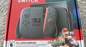 New
													Nintendo Switch 2 - Red & Blue, Standard, photo 5 of 6