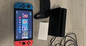 Mint
													Nintendo Switch - OLED - Red & Blue, 64 GB, photo 1 of 8