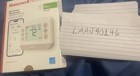 New
													Honeywell Thermostat, photo 2 of 2