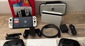 Mint
													Nintendo Switch - OLED - White, 64 GB, photo 1 of 14