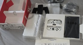 Mint
													Nintendo Switch - OLED - Black, 64 GB, Super Smash Bros., photo 1 of 3