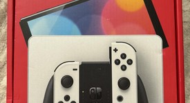 Mint
													Nintendo Switch - OLED - White, 64 GB, photo 2 of 14