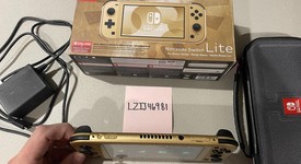 Good
													Nintendo Switch Lite - Gold, Hyrule Edition, photo 3 of 9