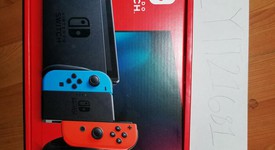 New
													Nintendo Switch - Red & Blue, 32 GB, photo 2 of 6