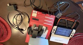 Mint
													Nintendo Switch - OLED - White, 64 GB, photo 4 of 11