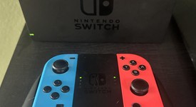 Mint
													Nintendo Switch - Red & Blue, 32 GB, photo 1 of 4