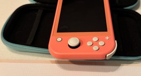 Good
													Nintendo Switch Lite - Coral, photo 4 of 12