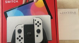 New
													Nintendo Switch - OLED - White, 64 GB, photo 1 of 6