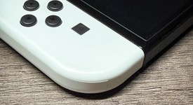 Mint
													Nintendo Switch - OLED - White, 64 GB, photo 4 of 14