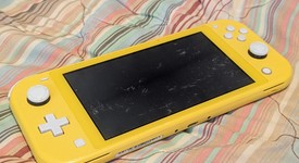 Fair
													Nintendo Switch Lite - Yellow, photo 1 of 6